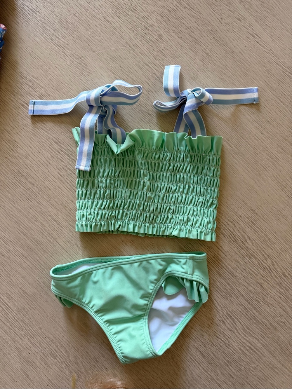 Kids Green Smocked Two-Piece Swim Set with Striped Shoulder Ties
